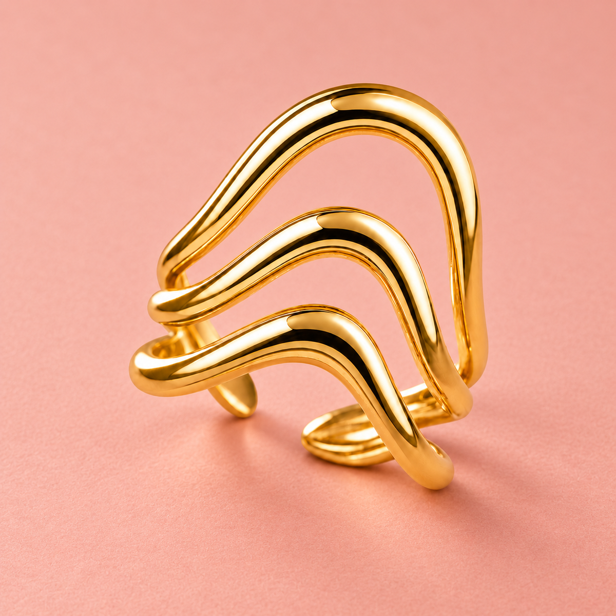 Gold-tone triple wave ring, detail view.
