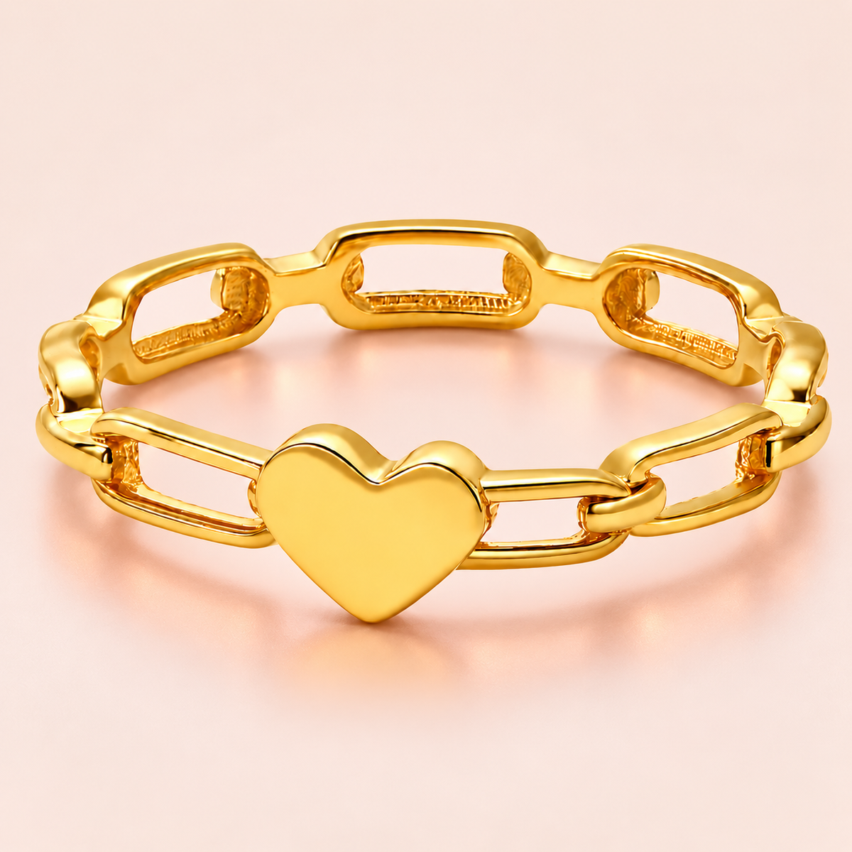 Gold-tone heart link ring, product view.