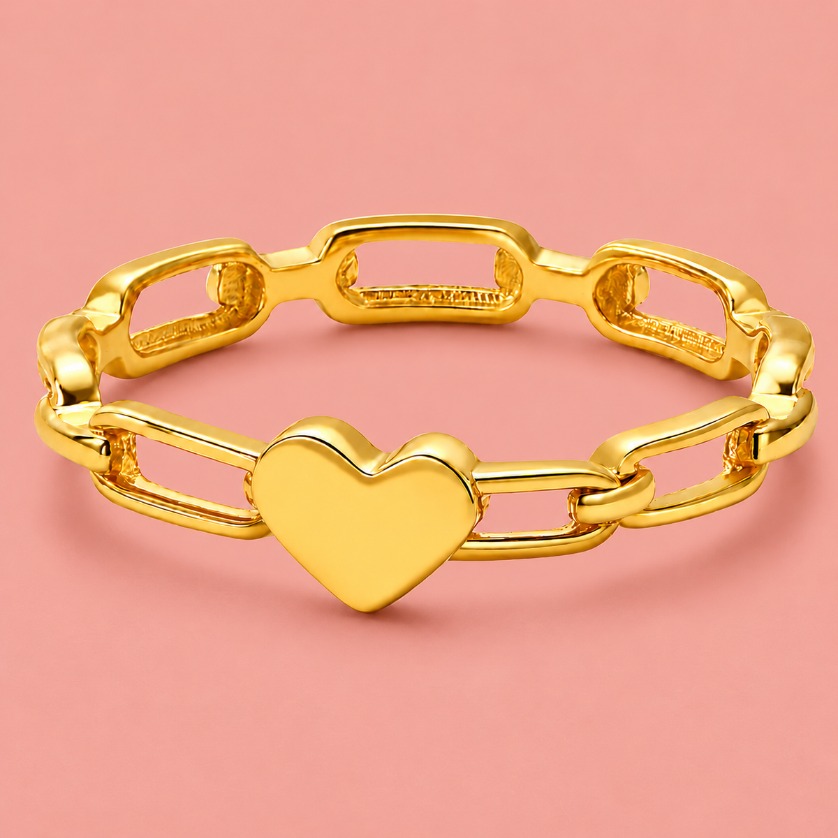 Gold-tone heart link ring, detail view.