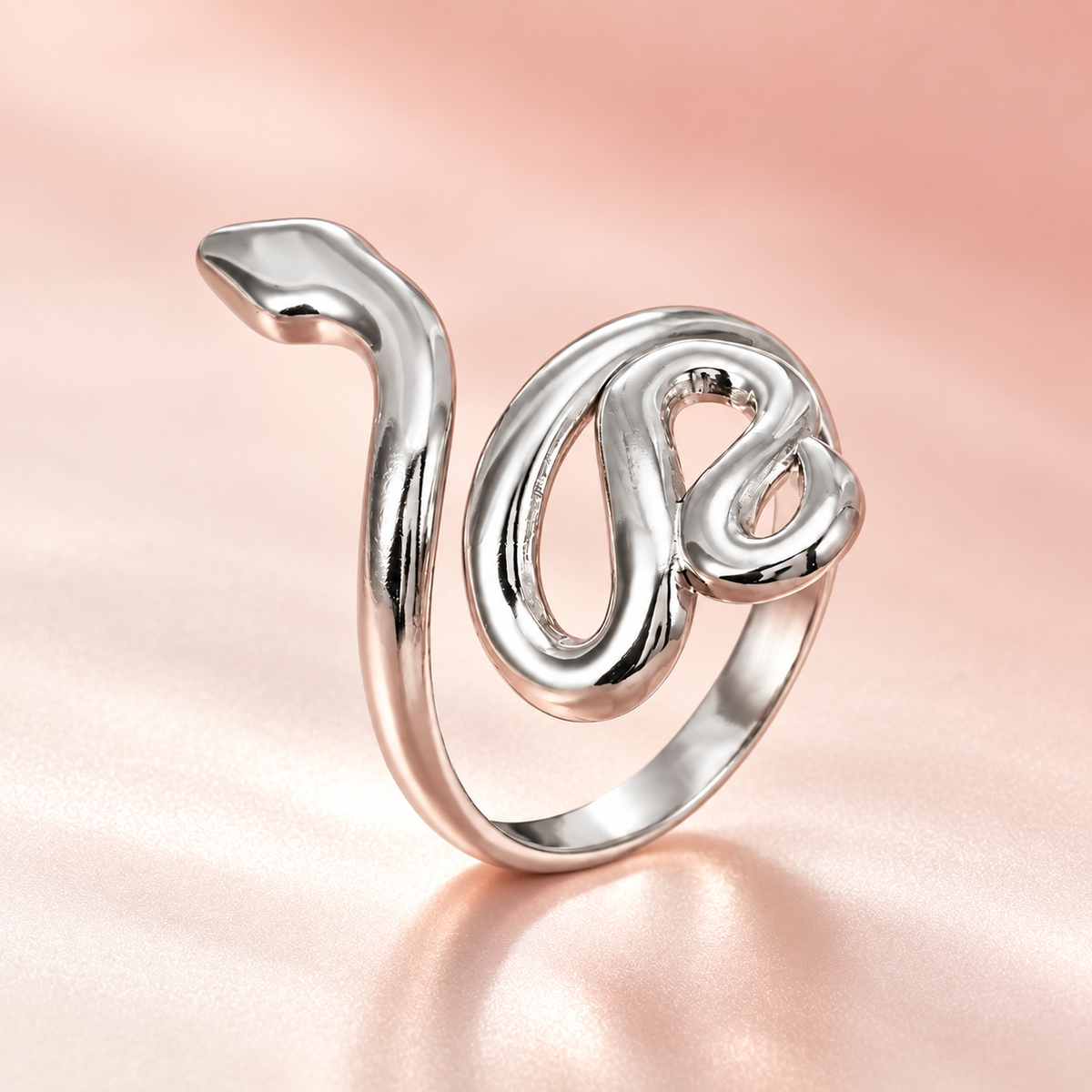 Silver-tone snake ring, close-up view.