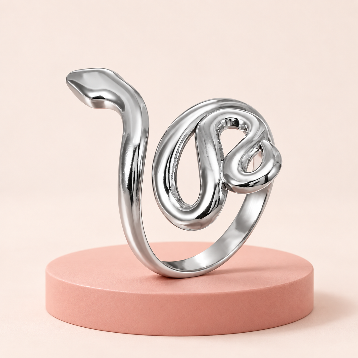 Silver-tone snake ring, styled product view.
