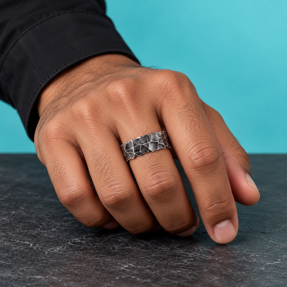 Dark Silver-Tone Faceted Open Ring for Men shown on a hand.