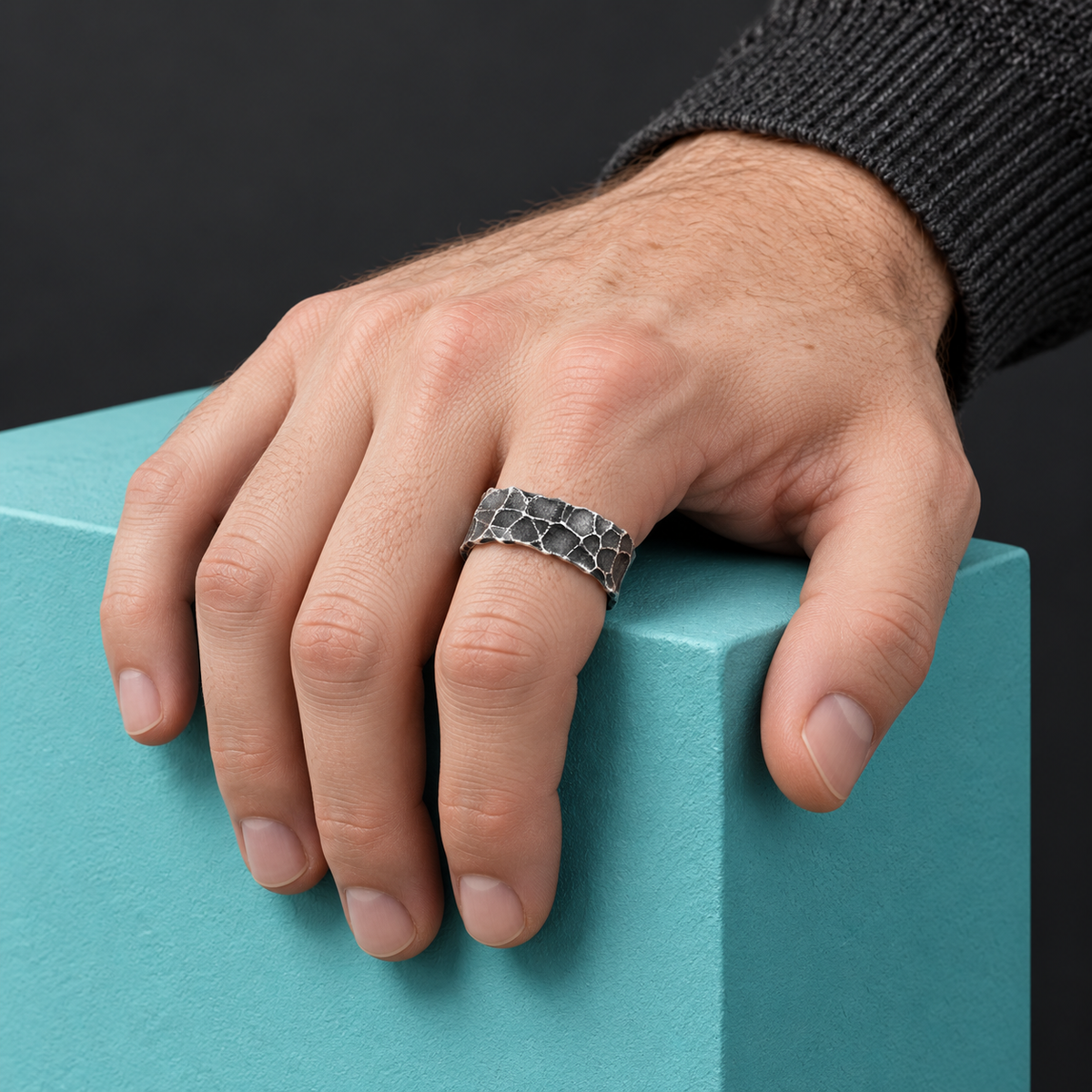 Dark Silver-Tone Faceted Open Ring for Men shown on a hand.