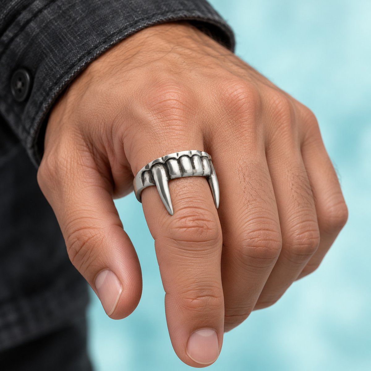 Fang Ring shown on a hand.