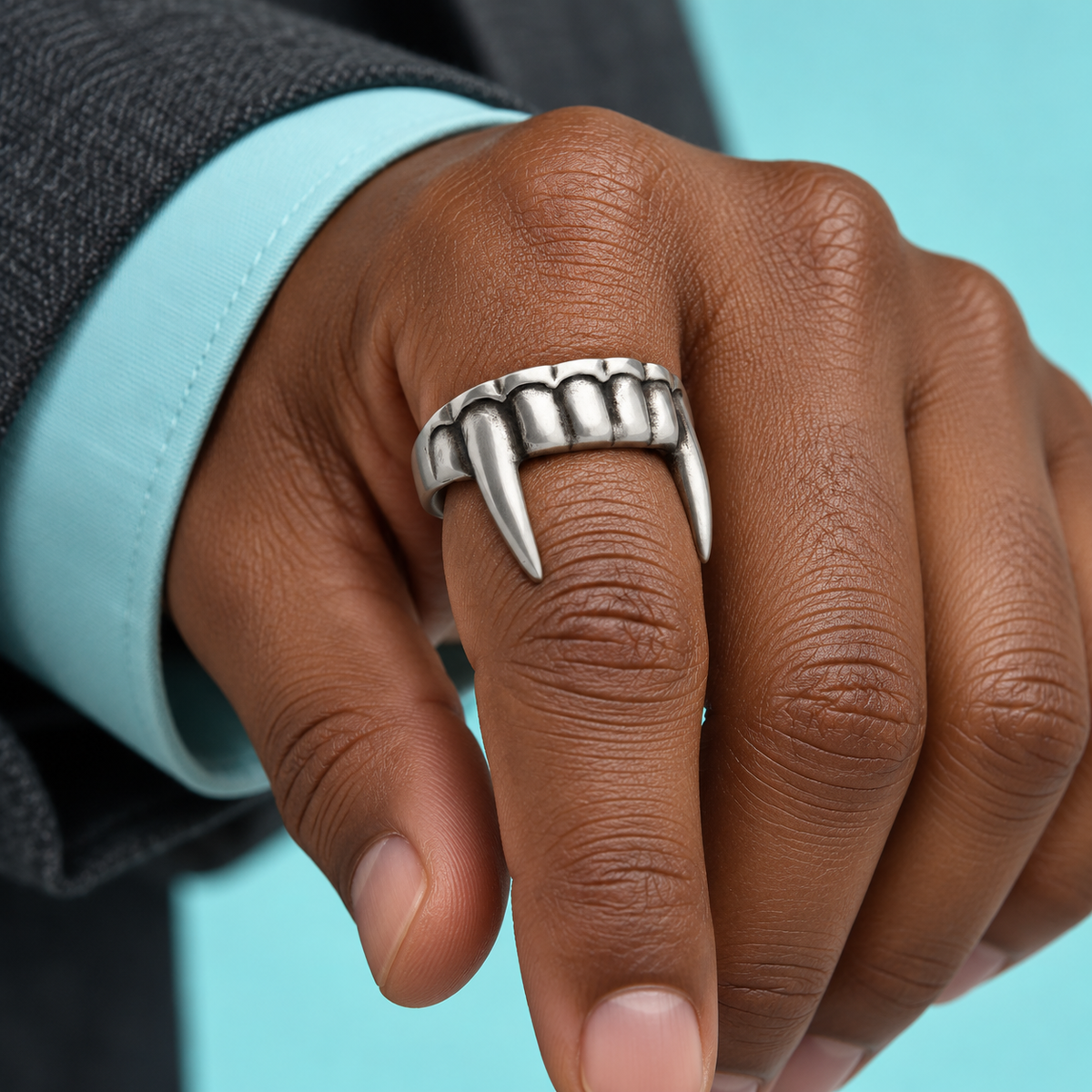 Fang Ring shown on a hand.