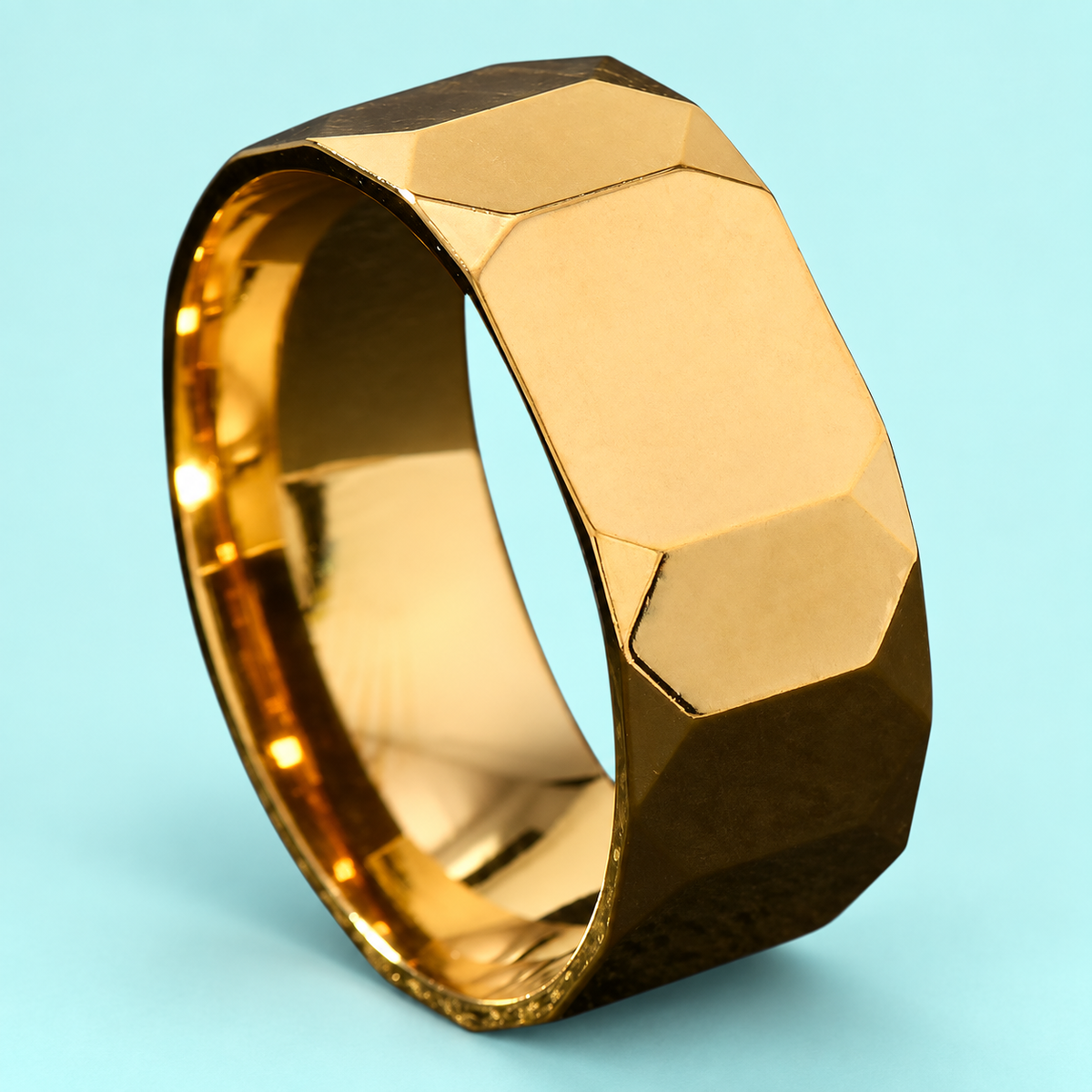 Gold-Tone Faceted Band in a styled product view.