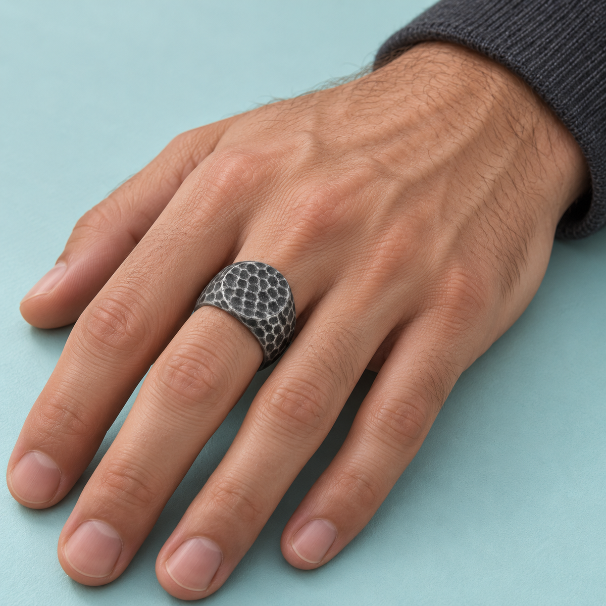 Dark Hammered-Look Signet Ring shown on a hand.