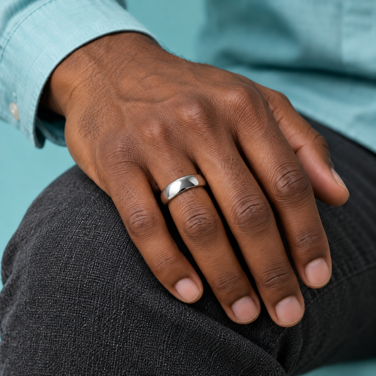 Smooth Silver-Tone Band shown on a hand.