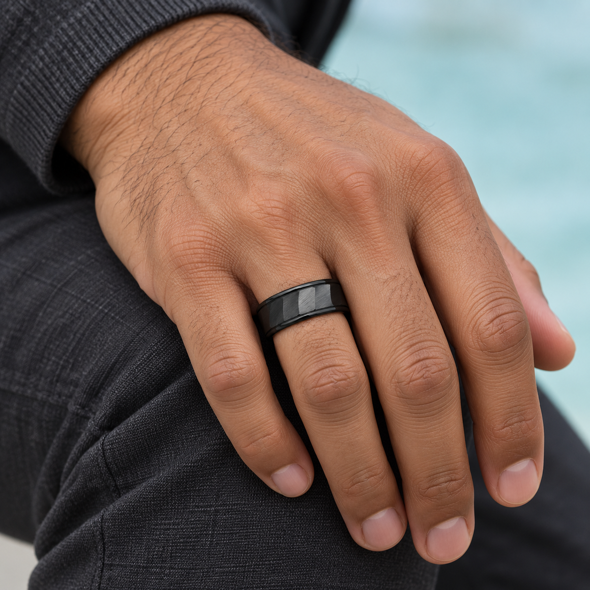 Black Faceted Panel Band shown on a hand.