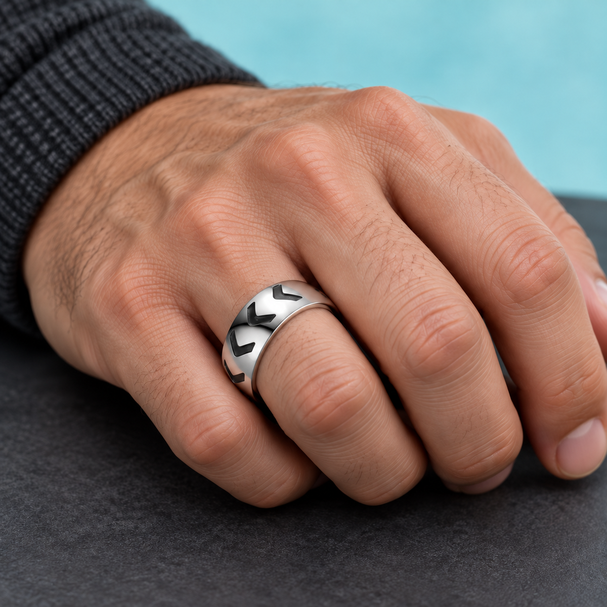 Silver-Tone Chevron Pattern Band shown on a hand.